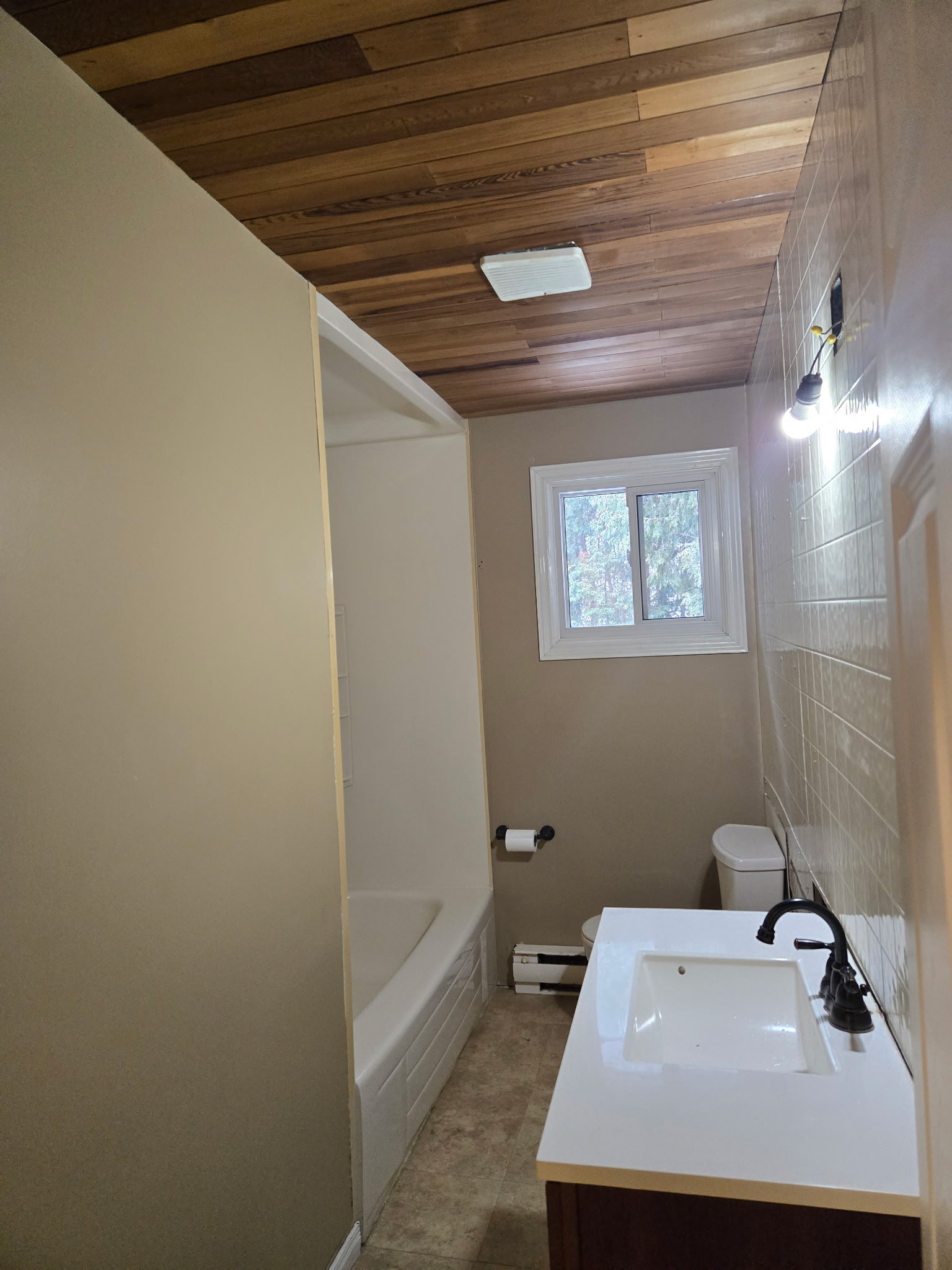 Before the washroom renovation (left wall)